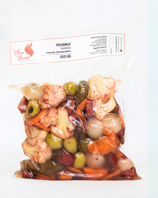 Pichanga Ahumada envasada, mezcla de vegetales y carnes ahumadas, ideal para picoteo y momentos compartidos.